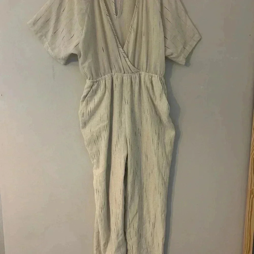 Anthropologie Feather Bone Soleil Cream V-Neck Jumpsuit